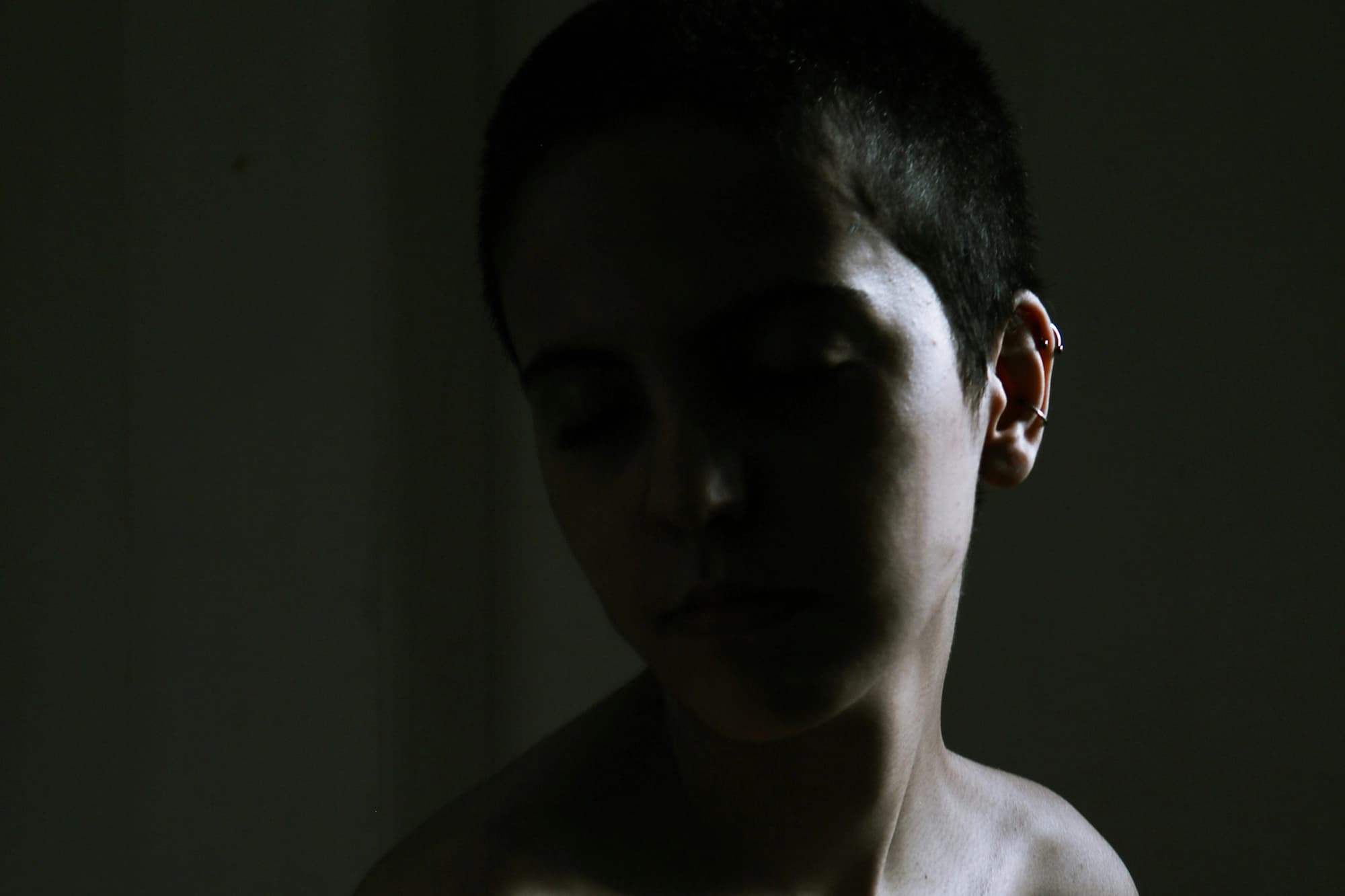 Close up of woman's body looking over her shoulder